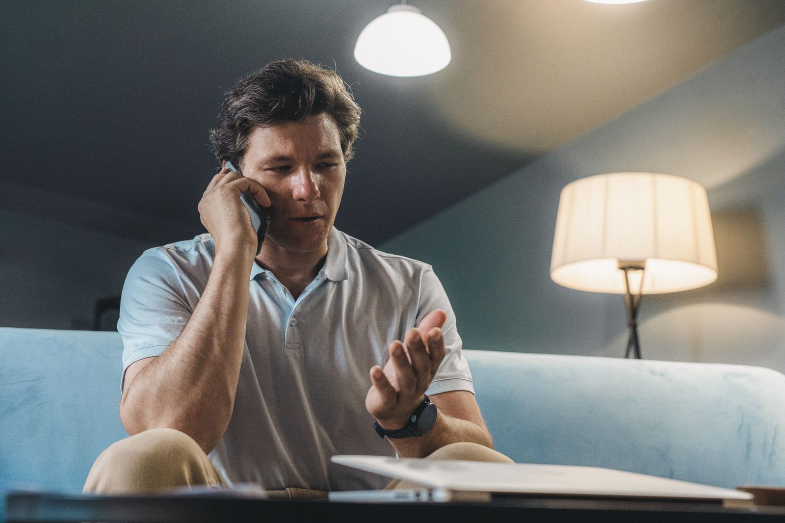 Man on a phone call looking concerned