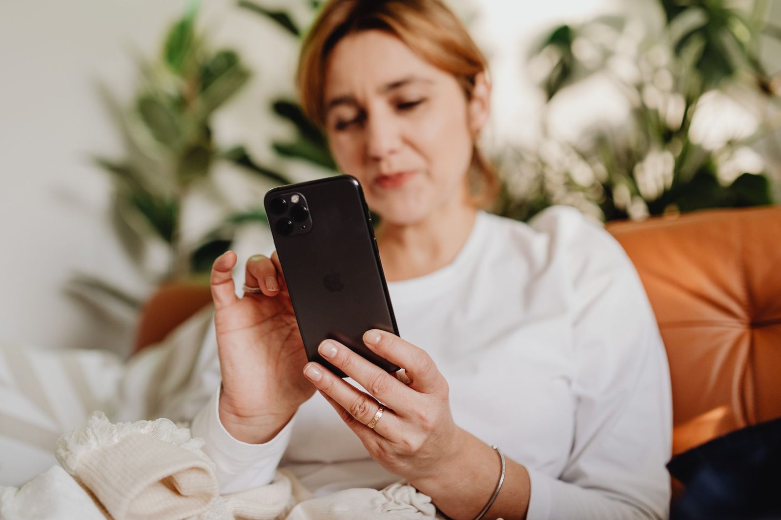 Woman reading a message on her phone
