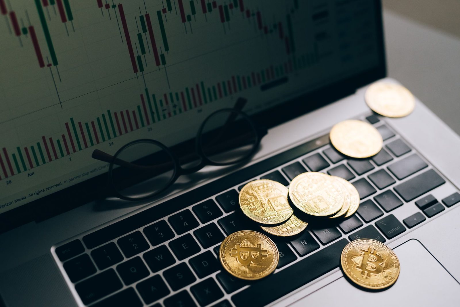 Coins on a laptop keyboard
